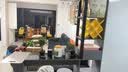 罗籍梦2025新款靠墙吧台桌家用轻奢简约隔断柜玄关转角酒柜一体长条餐桌 灰色+黑架[颗粒板] 140长*200高*30宽[送两个吧凳] 实拍图