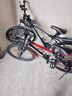 EG7山地自行车成人学生变速越野单车双减震赛车26寸青少年男女 辐条【加厚防滑轮-更安全】黑白 26寸21速【适合：160-180CM】 实拍图