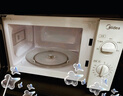 美的（Midea）快捷微波炉 家用小型 360°转盘加热 旋钮操控 易洁内胆（M1-L213B） 实拍图