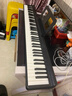特伦斯电子琴88键折叠琴成人儿童初学电钢键盘教学乐器V10便携钢琴 典雅黑+原装琴包+Z型琴架 实拍图