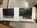 美科（Meirkergr）MK-975（智能版） 亮灯跟弹61键钢琴键多功能智能电子琴乐器 连接U盘手机pad带琴架 实拍图
