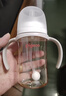 贝亲（Pigeon）自然成长翻盖直饮吸管 大童奶瓶330ml 经典款 18月+  AA278 实拍图