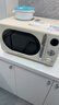 格兰仕（Galanz）复古微波炉 家用小型20L迷你 奶油风百搭复古 易清洁大平板 自动菜单 700瓦省电KAW0-SF2 实拍图