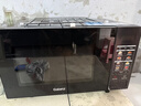 格兰仕（Galanz）变频微波炉烤箱一体机光波炉900瓦大功率速热家用23L大容量平板易清洁省电一级能效智能菜单烧烤 2026新升级彩膜BM1(S2) 实拍图