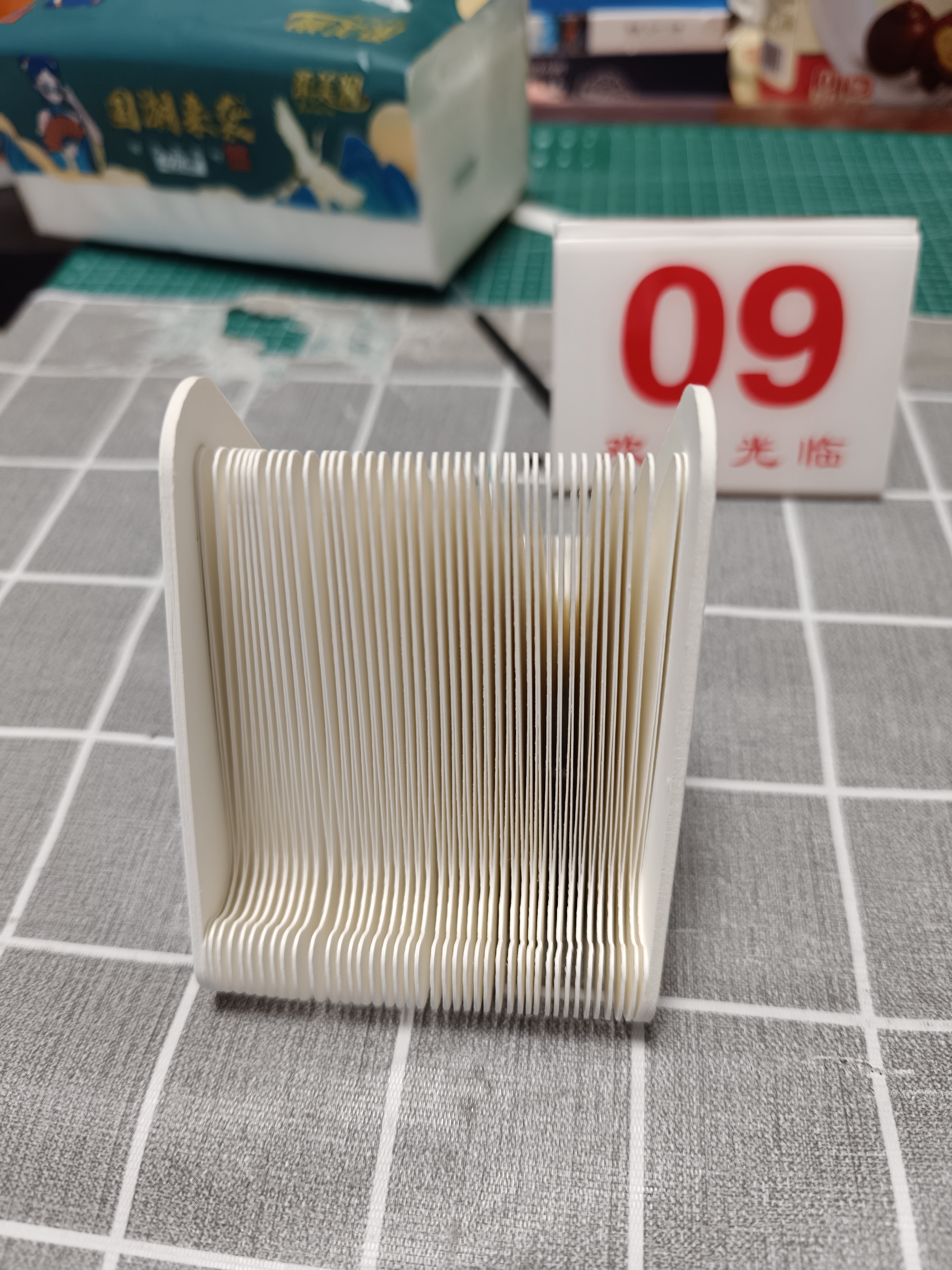 十八纸手机支架小巧便携创意支架底座办公书房桌面置物架手机平板通用 白色三角支架 实拍图