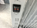 美的（Midea）【白玉】取暖器/电暖器/电暖气家用/烤火炉/13片节能速热/电热油汀/油酊/加热器/烘衣加湿HYX22N 实拍图