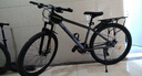 永久自行车成人山地车自行车学生男女铝合金变速公路自行车油碟单车 【钢架/全套轴承】摩天灰 27速 27.5寸【推荐175-195cm】 实拍图