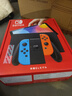 任天堂（Nintendo）【国内保税仓】Switch2/1代 OLED/续航加强日版/港版便携家用ns体感游戏机掌机 日版OLED红蓝+双人成行+Pro黑色手柄(保税仓 实拍图