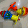 发光旋转陀螺 创意儿童闪光玩具 上链七彩陀螺 弹射带发射器玩具 【随机颜色】2个 实拍图