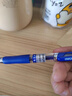 得力（deli）S01中性笔签字笔 0.5mm子弹头经典办公按动笔水笔 蓝色 12支/盒 S01 实拍图