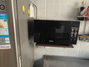 格兰仕（Galanz）变频微波炉烤箱一体机光波炉900瓦大功率速热家用23L大容量平板易清洁省电一级能效智能菜单烧烤 2026新升级彩膜BM1(S2) 实拍图