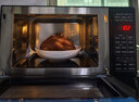 格兰仕（Galanz）家用微波炉 变频微波炉烤箱一体机 900瓦速热 省电一级能效 23升不锈钢内胆 平板式光波炉A7(B3) 实拍图