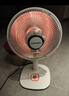 长虹（CHANGHONG）取暖器/小太阳/电暖器/电暖气/取暖电器/电热扇/电暖炉小型/烤火炉/快热炉 速热可摇头 台立两用【俯仰调节+网罩360mm】 1 实拍图