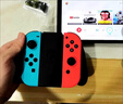 Nintendo Switch任天堂  游戏机 Switch NS港版OLED版游戏主机 配白色Joy-Con 便携游戏掌机 实拍图