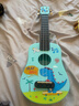 romusic尤克里里儿童初学者可弹奏卡通21英寸乌克丽丽小吉他乐器蓝色恐龙 实拍图