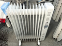 美的（Midea）【白玉】取暖器/电暖器/电暖气家用/烤火炉/13片节能速热/电热油汀/油酊/加热器/烘衣加湿HYX22N 实拍图