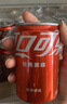 可口可乐（Coca-Cola）汽水 碳酸饮料 200ml*24罐  迷你摩登罐 新老包装随机发货 年货 实拍图