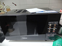 格兰仕（Galanz）变频微波炉烤箱一体机光波炉900瓦大功率速热家用23L大容量平板易清洁省电一级能效智能菜单烧烤 2026新升级彩膜BM1(S2) 实拍图