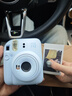 富士（FUJIFILM）instax  mini12 一次成像 立拍立得相机 mini12 绣球蓝 套餐九（官方标配+相机包+相册+白边相纸40张） 实拍图