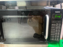 格兰仕（Galanz）微波炉烤箱一体机光波20L家用700W节能平板易清洁智能菜单多功能小型烧烤解冻预约DG 全新机器 实拍图