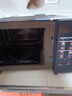 格兰仕（Galanz）变频微波炉烤箱一体机光波炉900瓦大功率速热家用23L大容量平板易清洁省电一级能效智能菜单烧烤 2026新升级彩膜BM1(S2) 实拍图