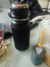 杯套保温杯保护套斜跨通用水杯套防摔隔热防烫玻璃杯袋子提绳简约 黑色加大号（8cm*21cm） 无规格 实拍图