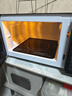 格兰仕（Galanz）微波炉烤箱一体机光波20L家用700W节能平板易清洁智能菜单多功能小型烧烤解冻预约DG 全新机器 实拍图