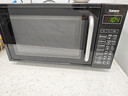 格兰仕（Galanz）微波炉烤箱一体机光波20L家用700W节能平板易清洁智能菜单多功能小型烧烤解冻预约DG 全新机器 实拍图