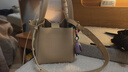 Songmont中号菜篮子系列女设计师款头层牛皮大容量通勤手提包 奶昔白 帆布内胆 现货 实拍图
