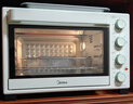 美的（Midea）35L家用多功能空气炸锅电烤箱一体机 热风空气炸/独立控温/均匀烘烤/热风循环 PT3515 实拍图