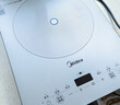 美的（Midea）家用电磁炉电陶炉电池炉2200W大功率猛火新型电磁灶一体微晶面板爆炒炒菜智能定时火锅炉MC-E22B60 实拍图