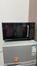 格兰仕（Galanz）微波炉烤箱一体机光波20L家用700W节能平板易清洁智能菜单多功能小型烧烤解冻预约DG 全新机器 实拍图