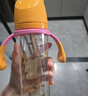 贝亲（Pigeon）自然成长翻盖直饮吸管 大童奶瓶330ml 马戏团 18月+ AA279 实拍图