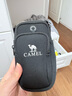 骆驼（CAMEL）户外男女款运动手臂包 双袋容纳男女手臂包 8W3AMT004 黑色 实拍图