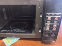 格兰仕（Galanz）变频微波炉烤箱一体机光波炉900瓦大功率速热家用23L大容量平板易清洁省电一级能效智能菜单烧烤 2026新升级彩膜BM1(S2) 实拍图