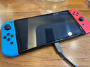 任天堂（Nintendo）【国内保税仓】Switch2/1代 OLED/续航加强日版/港版便携家用ns体感游戏机掌机 日版OLED红蓝+宝可梦紫(保税仓） 实拍图