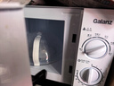 格兰仕微波炉 家用 20升转盘加热 五档火力 易洁内胆 解冻 机械旋钮操控G5W0 实拍图