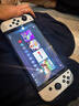 任天堂（Nintendo）【国内保税仓】Switch2/1代 OLED/续航加强日版/港版便携家用ns体感游戏机掌机 港版OLED白色64GB保税（赠共享会员） 实拍图