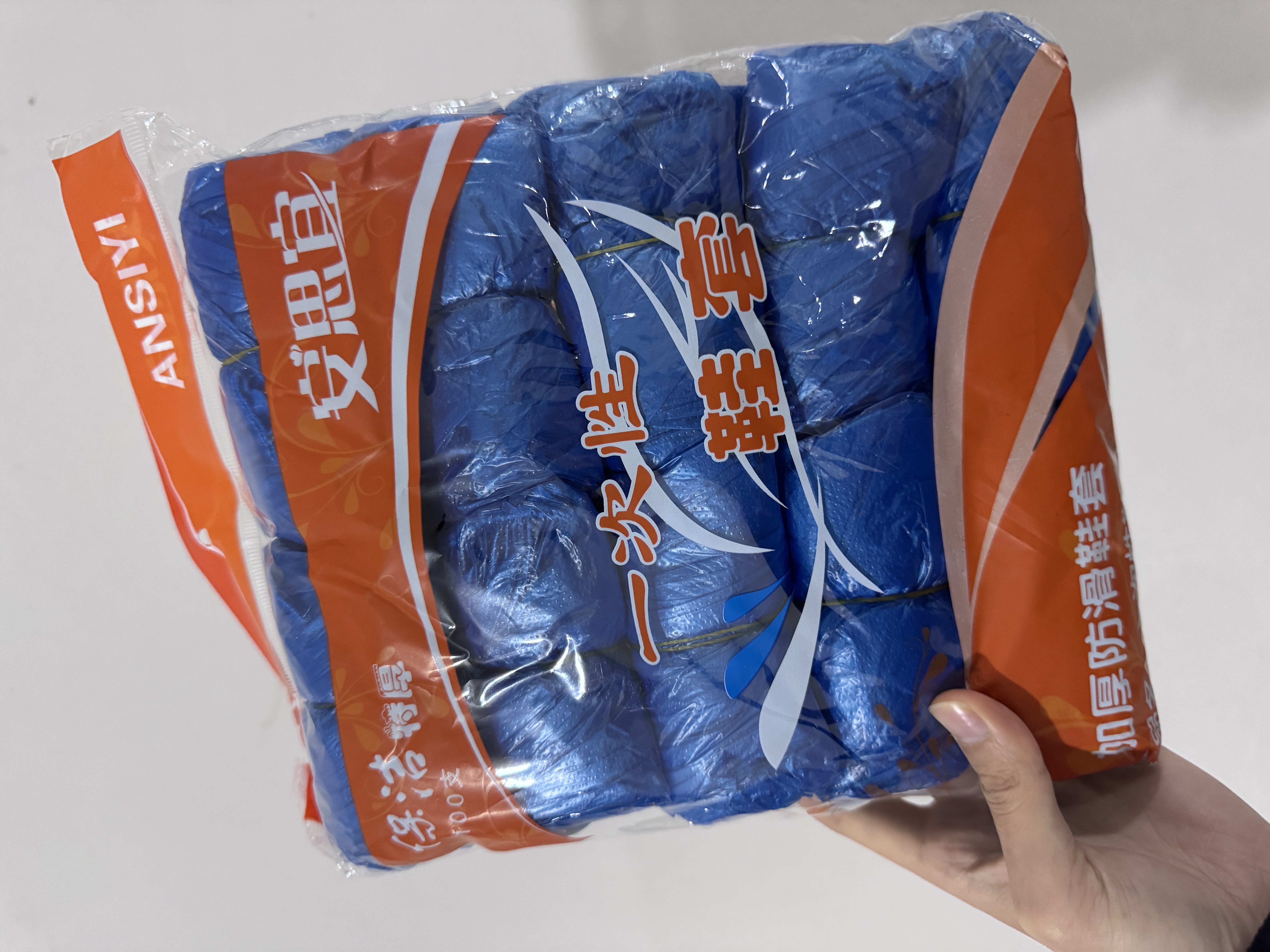 家用一次性鞋套防水加厚耐磨防滑胶套塑料鞋套室内客人防尘塑料套 2g【特厚】100只 实拍图