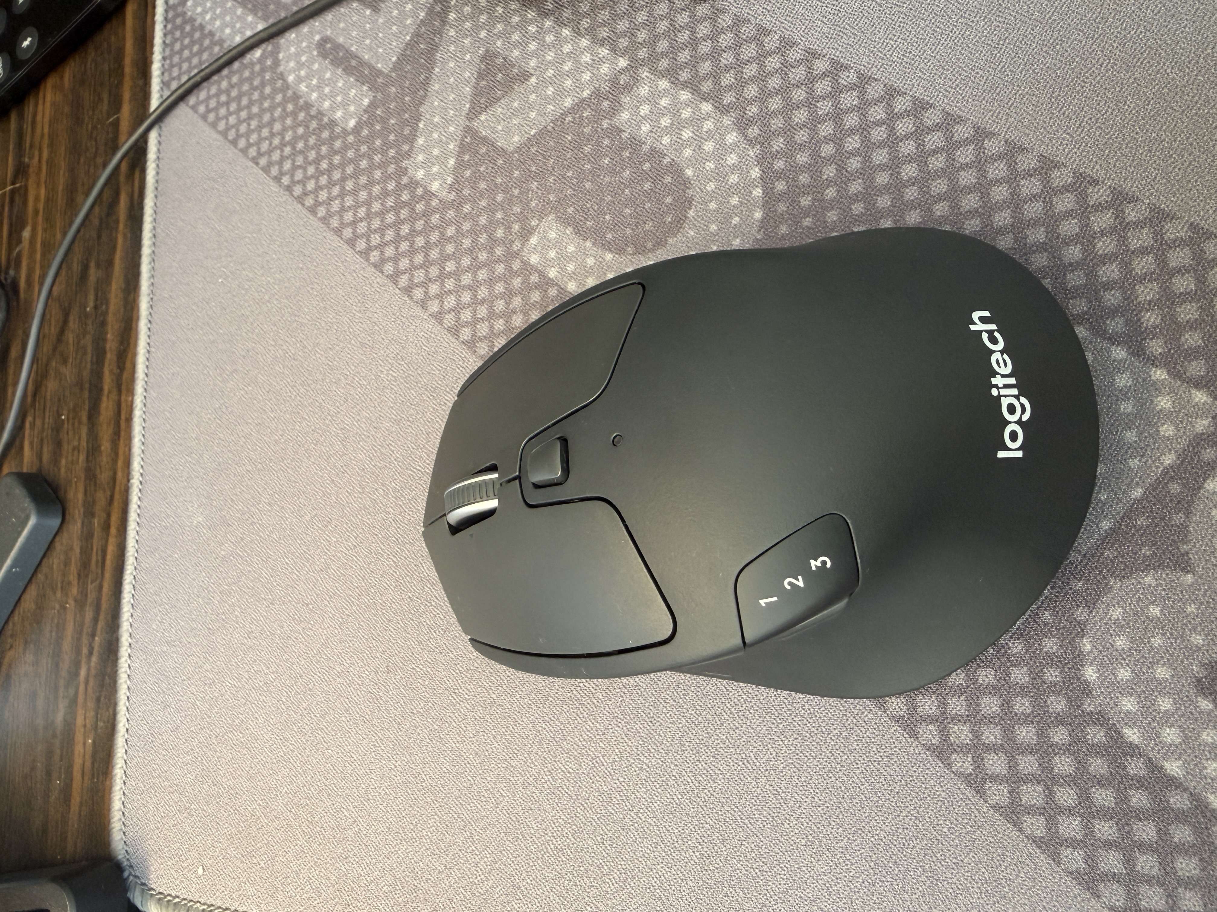 罗技（Logitech）M720无线蓝牙鼠标家用无线双模鼠标MAC笔记本ipad鼠标优联双模多设备自定义按键 M720【带电池】＋鼠标垫 实拍图