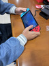 任天堂（Nintendo）【国内保税仓】Switch2/1代 OLED/续航加强日版/港版便携家用ns体感游戏机掌机 日版OLED红蓝+塞尔达荒野之息(保税仓） 实拍图