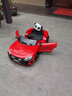 星辰皓奥迪儿童电动车四驱汽车遥控四轮宝宝玩具车可坐人童车RSGT 红色+四驱+遥控+摇摆+皮座+软轮 实拍图