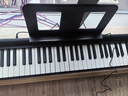 特伦斯手卷钢琴88键折叠电子钢琴便携成人儿童演奏钢琴键盘 实拍图