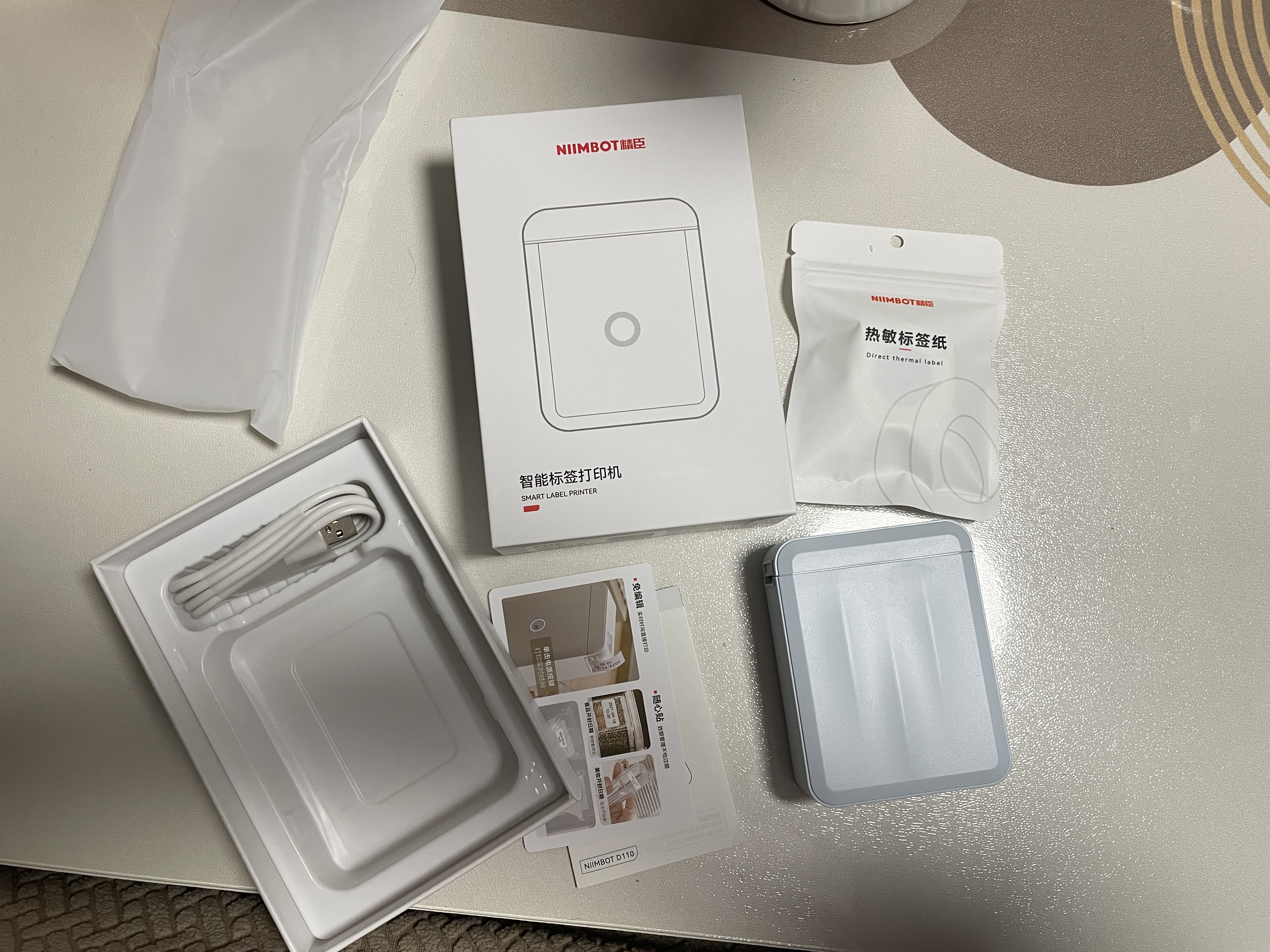 精臣D110便携式智能标签打印机小型打价格标签机不干胶家用便签文件夹手账姓名贴幼儿园防水名字贴开学 D110云水蓝（送1卷白色标签） 实拍图