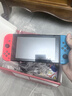 任天堂（Nintendo）【国内保税仓】Switch2/1代 OLED/续航加强日版/港版便携家用ns体感游戏机掌机 日版续航红蓝32GB保税（赠共享会员） 实拍图