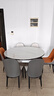 奥利克丝 亮光岩板餐桌椅组合 现代简约实木餐桌可伸缩折叠圆桌吃饭桌子 亮光雪山白-黑白框架轻奢皮椅款 1.35米 一桌六椅【12MM加厚岩板】 实拍图