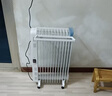 美的（Midea）【白玉】取暖器/电暖器/电暖气家用/烤火炉/13片节能速热/电热油汀/油酊/加热器/烘衣加湿HYX22N 实拍图