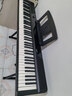 特伦斯（Terence）电钢琴88键折叠电子钢琴儿童初学者考级成人家用钢琴V50便携钢琴 深空黑SE 官方标配+可升降琴架 实拍图