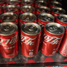 可口可乐（Coca-Cola）汽水 碳酸饮料 200ml*24罐  迷你摩登罐 新老包装随机发货 实拍图