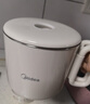 美的（Midea）第二代便携式可折叠烧水杯电热水壶春游差旅 保温泡面杯小容量迷你无缝内胆 0.7升 SH07S104 实拍图